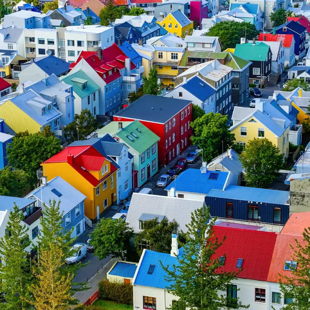 Colorful Red Green Blue Yellow Houses Cars Streets Reykjavik Iceland. Most houses are made of corrugated metal.