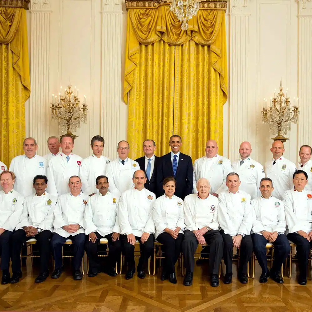 Photo of renowned chefs lined up with Barrack Obama in the center 