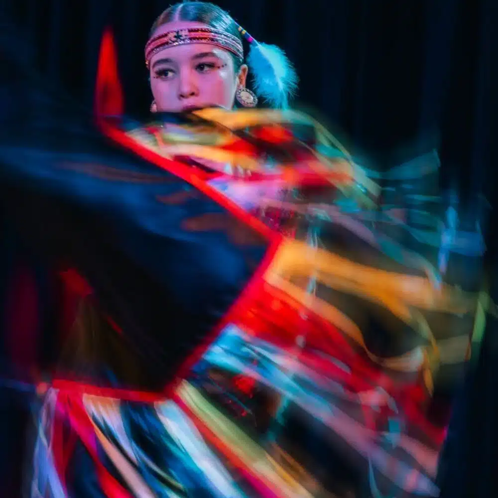 journey-canada Innu dancer in traditional dress, Canada